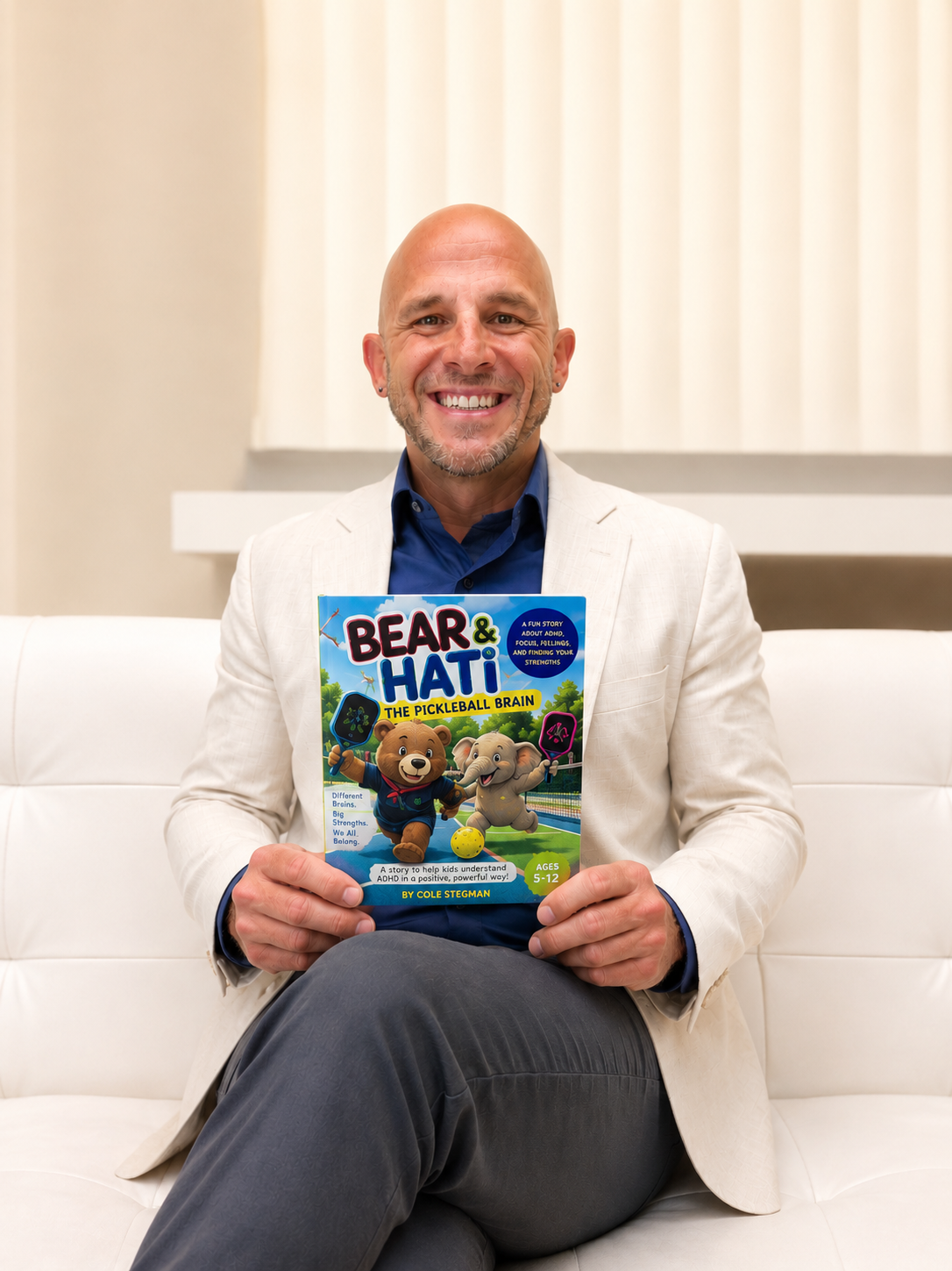 Cole Stegman holding The Pickleball Brain — Bear and Hati Series 1 ADHD children's book for ages 5 to 12